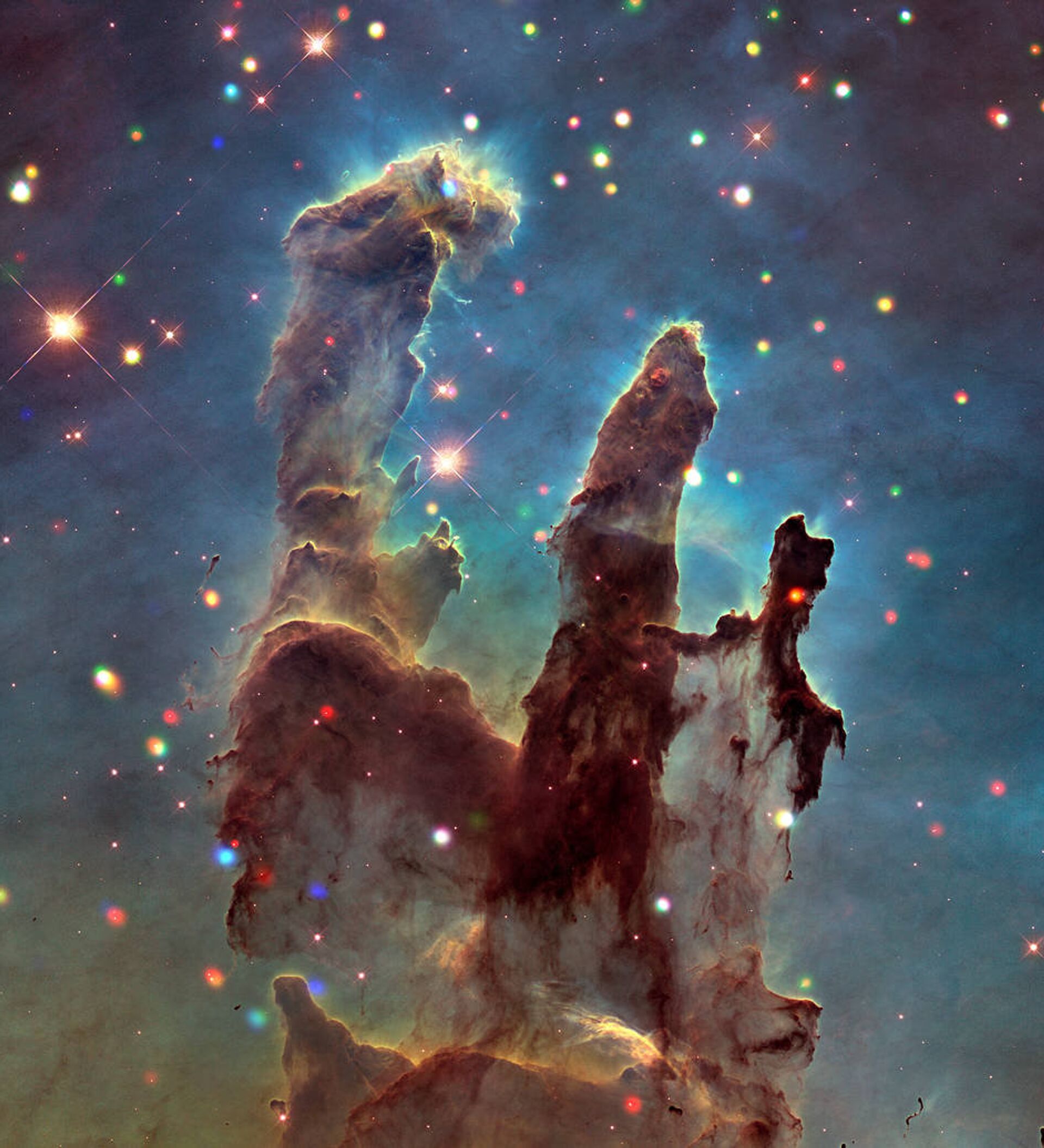 A famosa imagem dos Pilares da Criação capturada pelo Telescópio Espacial Hubble na Nebulosa da Águia.